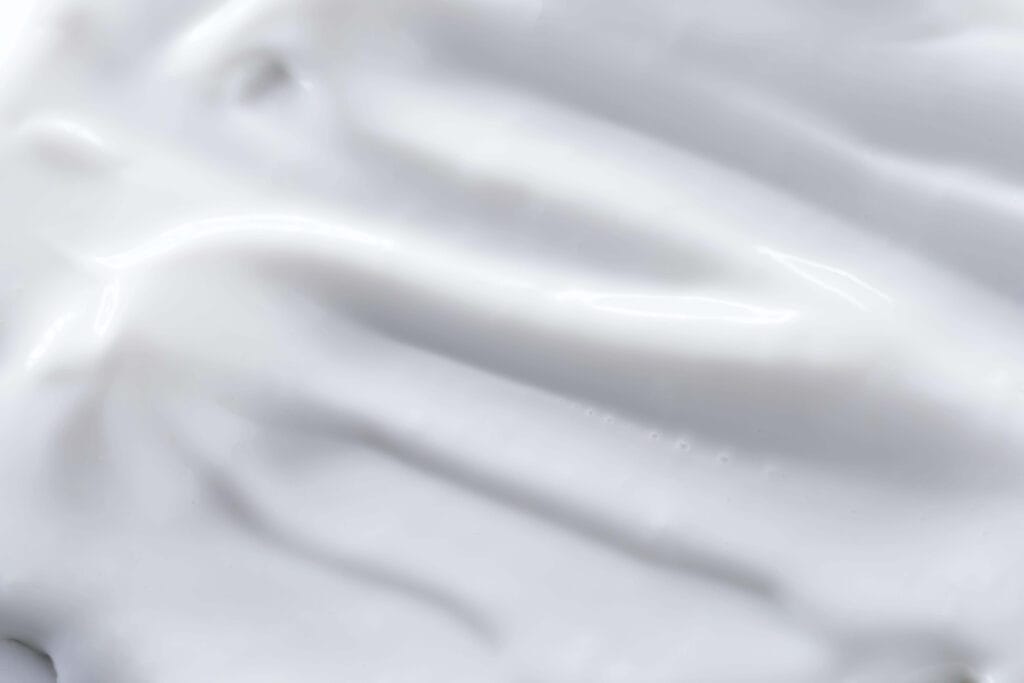 White cream smear closeup representing ceramides in skincare routine
