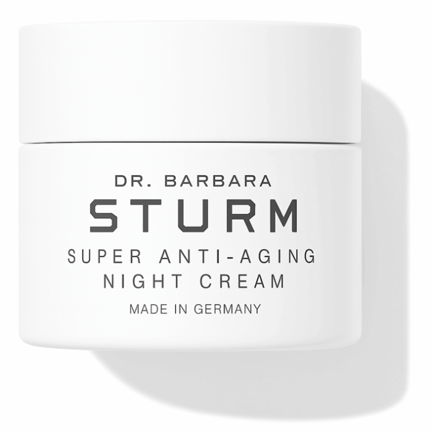 Dr. Barbara Sturm, one of the most luxe night creams, shown in a white jar with black writing.