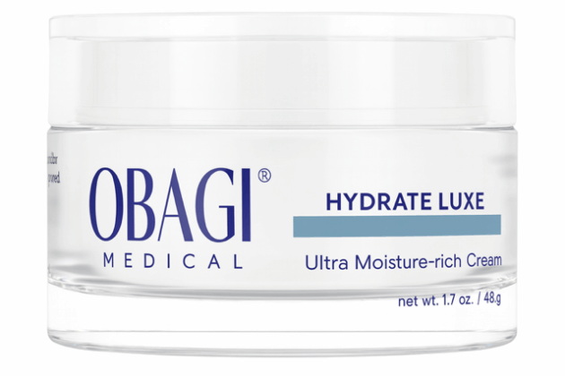 Obagi, one of the most luxe night creams, shown in a white glass jar with blue writing.