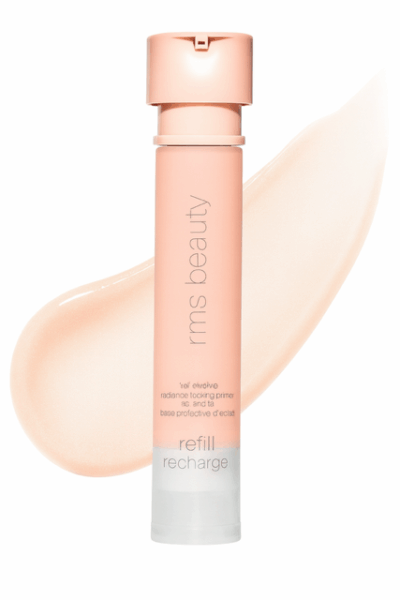 RMS Beauty Revolve Radiance Locking Primer tube with tan product smear in background