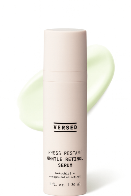 Versed cream moisturizer bottle on white background and light green product smear behind.