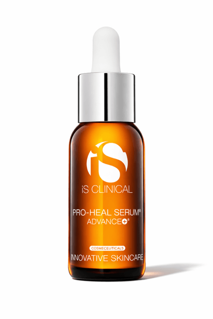 iS Clinical Pro-Heal Serum Advance+ in an orange dropper bottle on white background.