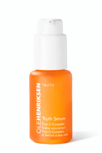 Ole Henriksen Truth Serum Collagen Booster in orange bottle — best serum for lightweight hydration routine.