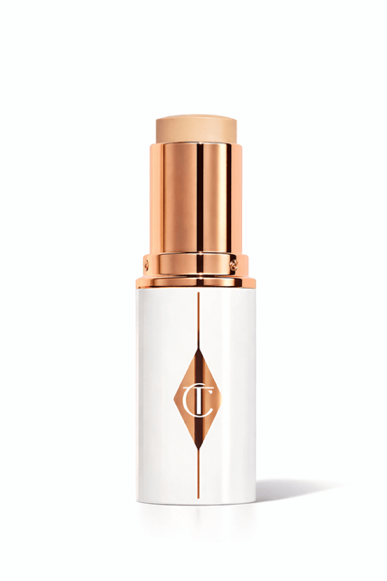 Charlotte Tilbury Unreal Skin Tint Foundation Stick on white background.