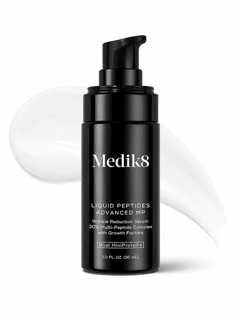 Medik8 Liquid Peptides Advanced MP product bottle with white smear behind.