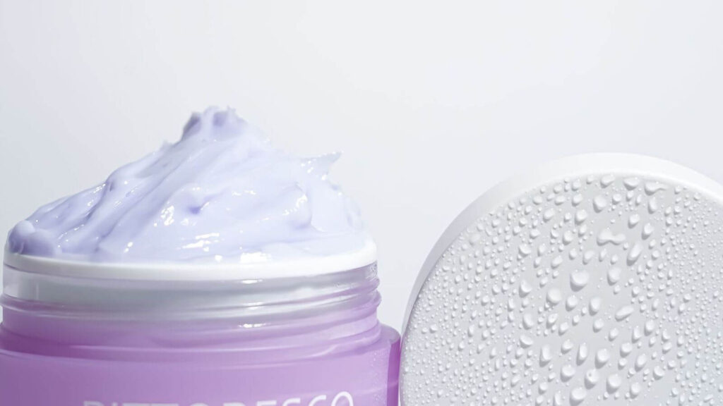 Jar of cream illustrating how to choose the right moisturizer texture for glowing skin.